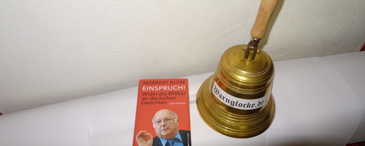 Kleine Warnglocke mit Buch